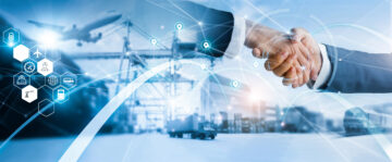 Handshake overlaid on a busy port with logistics icons and global trade symbols.